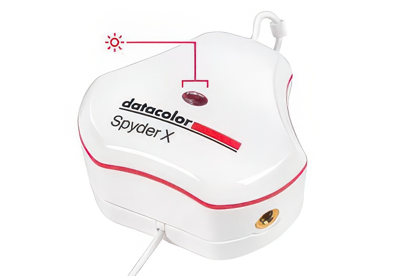 Datacolor Spyder X colorimeter with its ambient light sensor highlighted